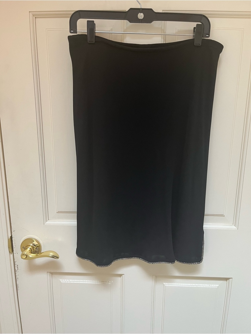 Classic Black Women's Skirt with embellished hem